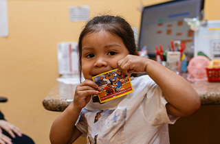child with toothbrush
