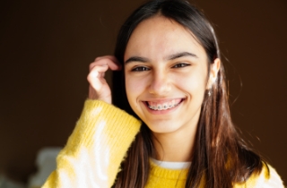 girl smiling with braces