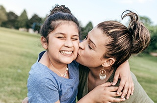 mother and daughter hugging