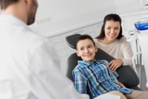 Child and parent at dentist