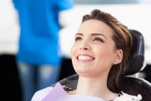 woman smiling in the dental chair