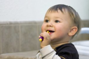 A child brushing his teeth.