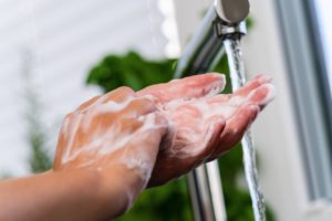 Your Mesquite dentist thoroughly washing their hands