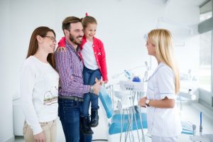 family visiting dentist in far north Dallas