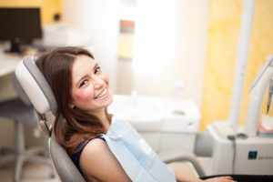 woman visits dentist at Love Field