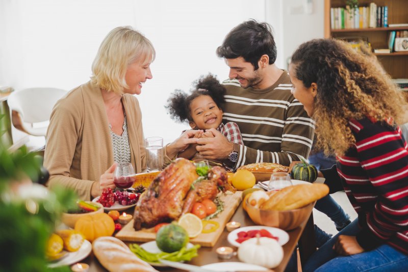family eating Thanksgiving dinner