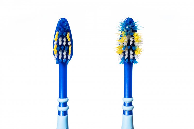 one new and one old toothbrush in North Dallas