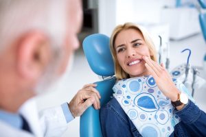 a patient visiting her dentist in Mesquite