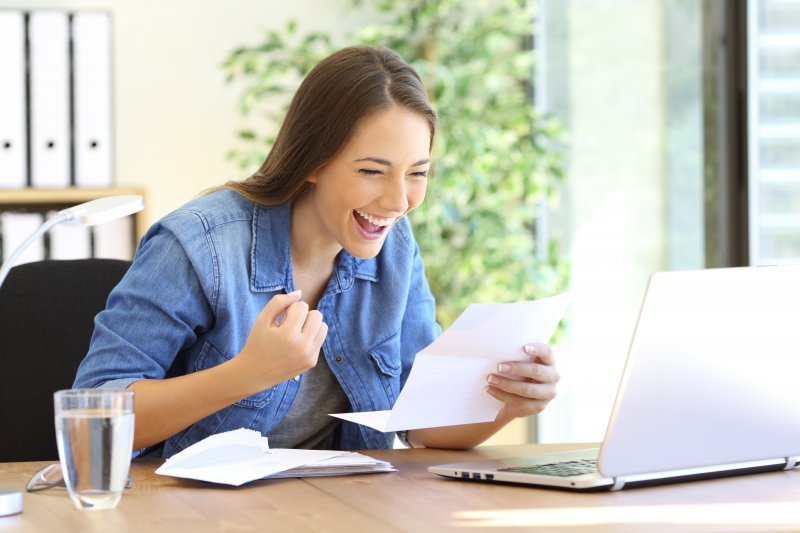 a woman smiling about her tax refund in Duncanville