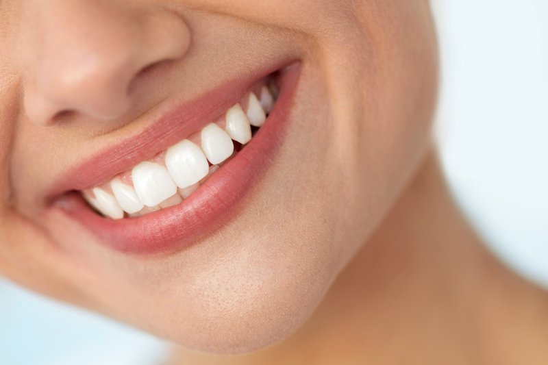 A closeup of a smile with white teeth