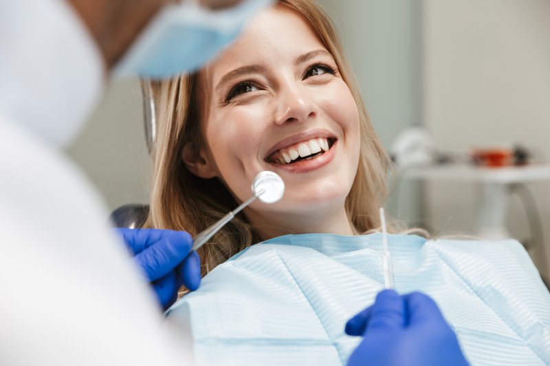 Patient smiles at dentist