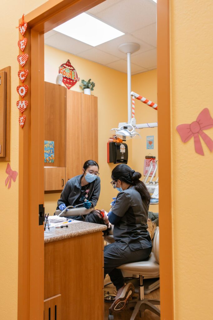 Bear Creek team working on patient in exam room