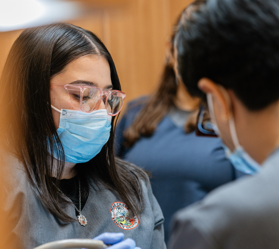 Dental team performing surgery