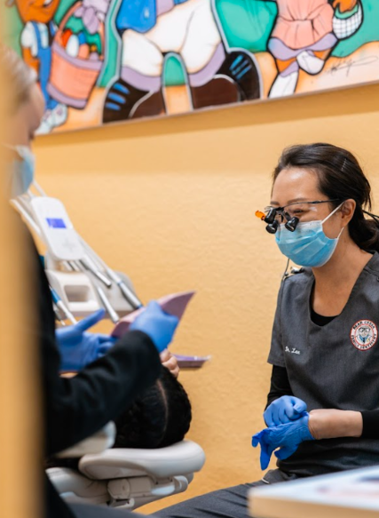 Dentist chatting with colleague